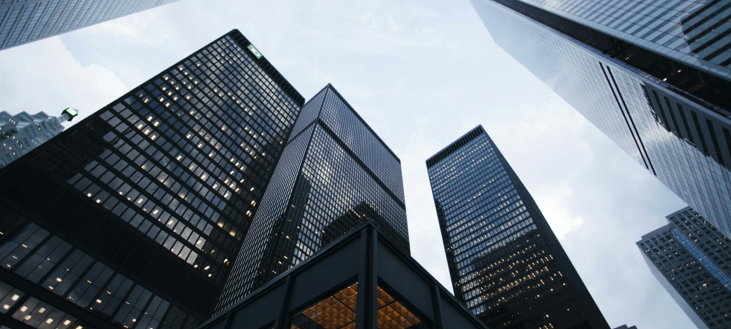 low angle photo of city high rise buildings during daytime